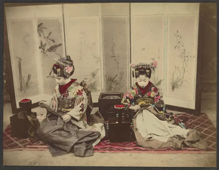 Two Maiko Pursuing Needlework